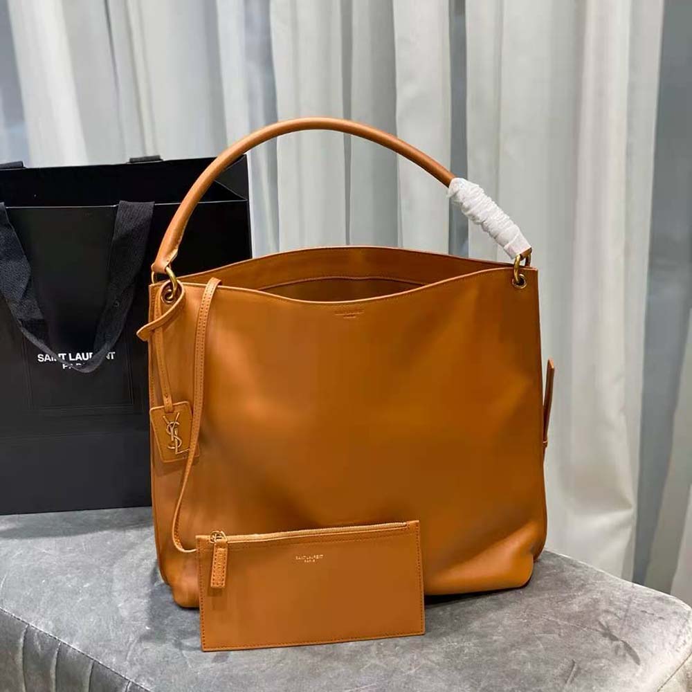 Close-up of YSL logo hardware on Saint Laurent YSL Women Tag Hobo Bag