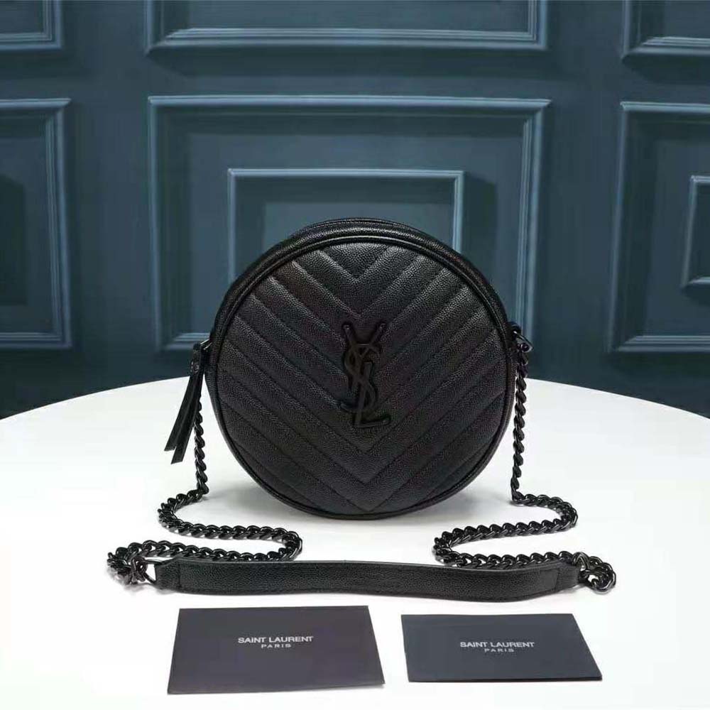 Close-up of chevron quilting and gold YSL hardware on Saint Laurent camera bag