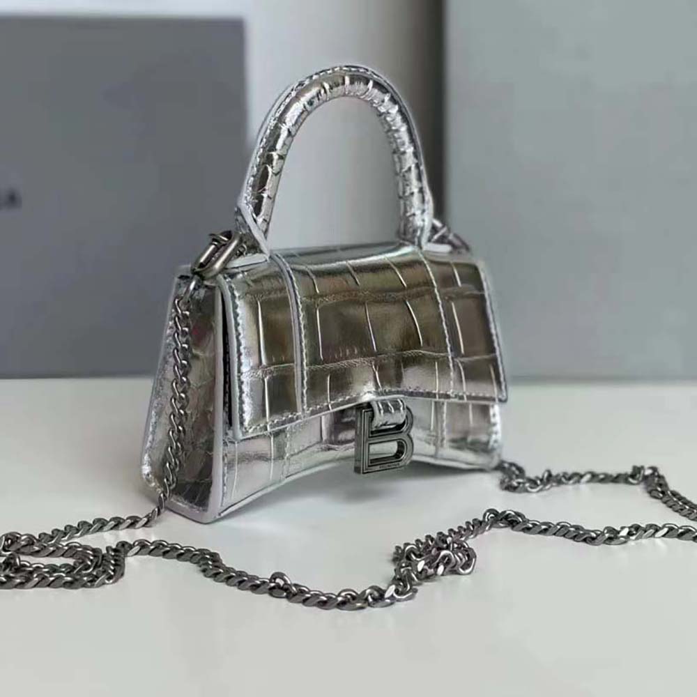 Side angle showing polished silver hardware on Balenciaga Hourglass Mini bag