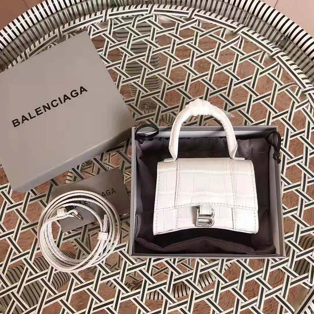 Close-up detail of shiny crocodile embossing on Balenciaga Women Hourglass Mini Bag