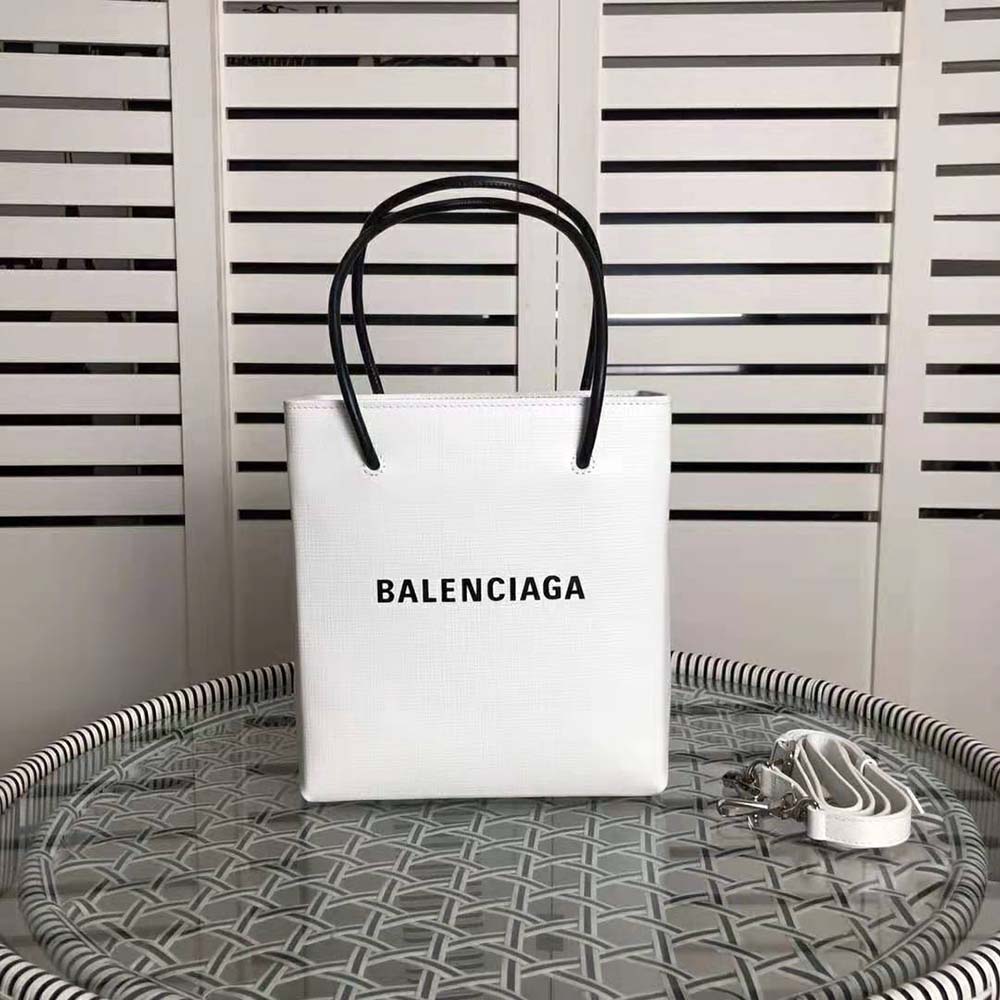 Close-up detail of squared calfskin texture on Balenciaga white tote