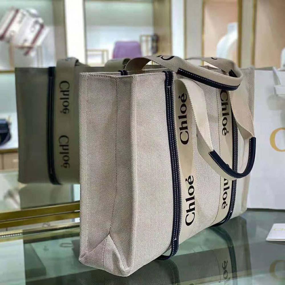 Side profile showing spacious interior of Chloe Women Large Woody Tote Bag