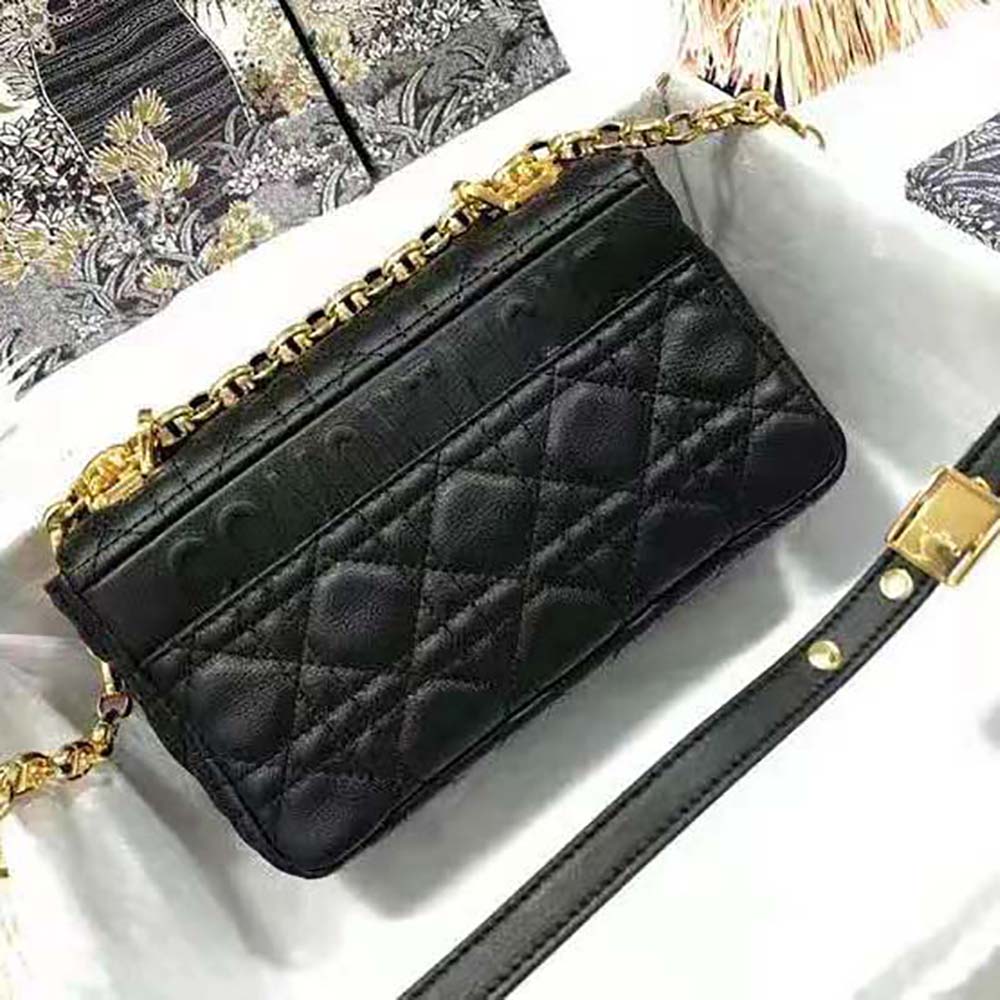 Side angle showing flap closure and hardware on Dior Women Small Dior Caro Bag