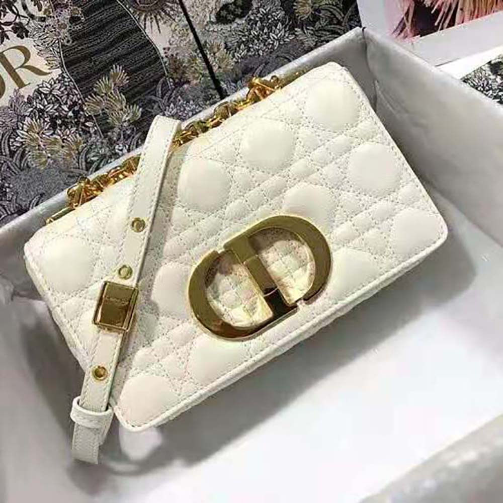Close-up of silver-tone Cannage hardware on small Dior Caro Bag