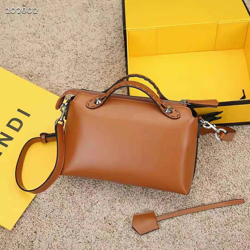 Side angle showing the silhouette of Fendi Women Medium by the way Brown Leather Boston Bag