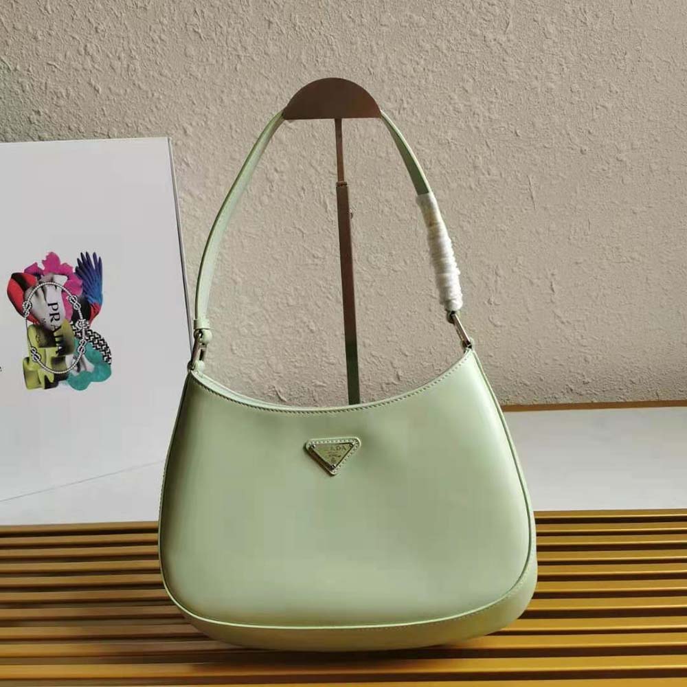 Close-up of gold-tone hardware on Prada Cleo Brushed Leather Shoulder Bag-Aqua