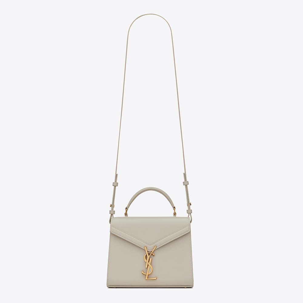 Front view of Saint Laurent YSL Women Cassandra Mini Top Handle Medium Bag white leather