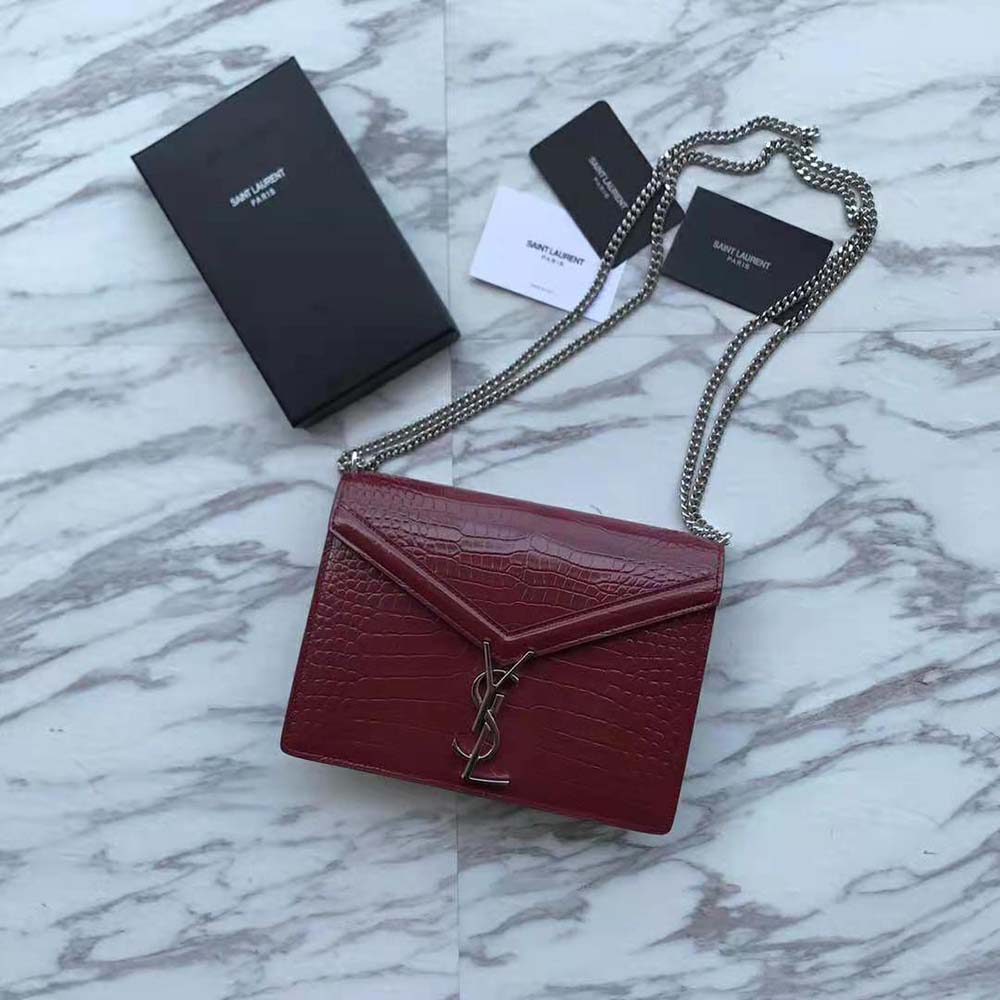 Side profile showing maroon leather texture of Saint Laurent YSL Cassandra bag