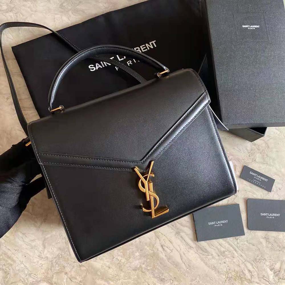 Close-up of YSL logo and silver hardware on Cassandra Top Handle Bag