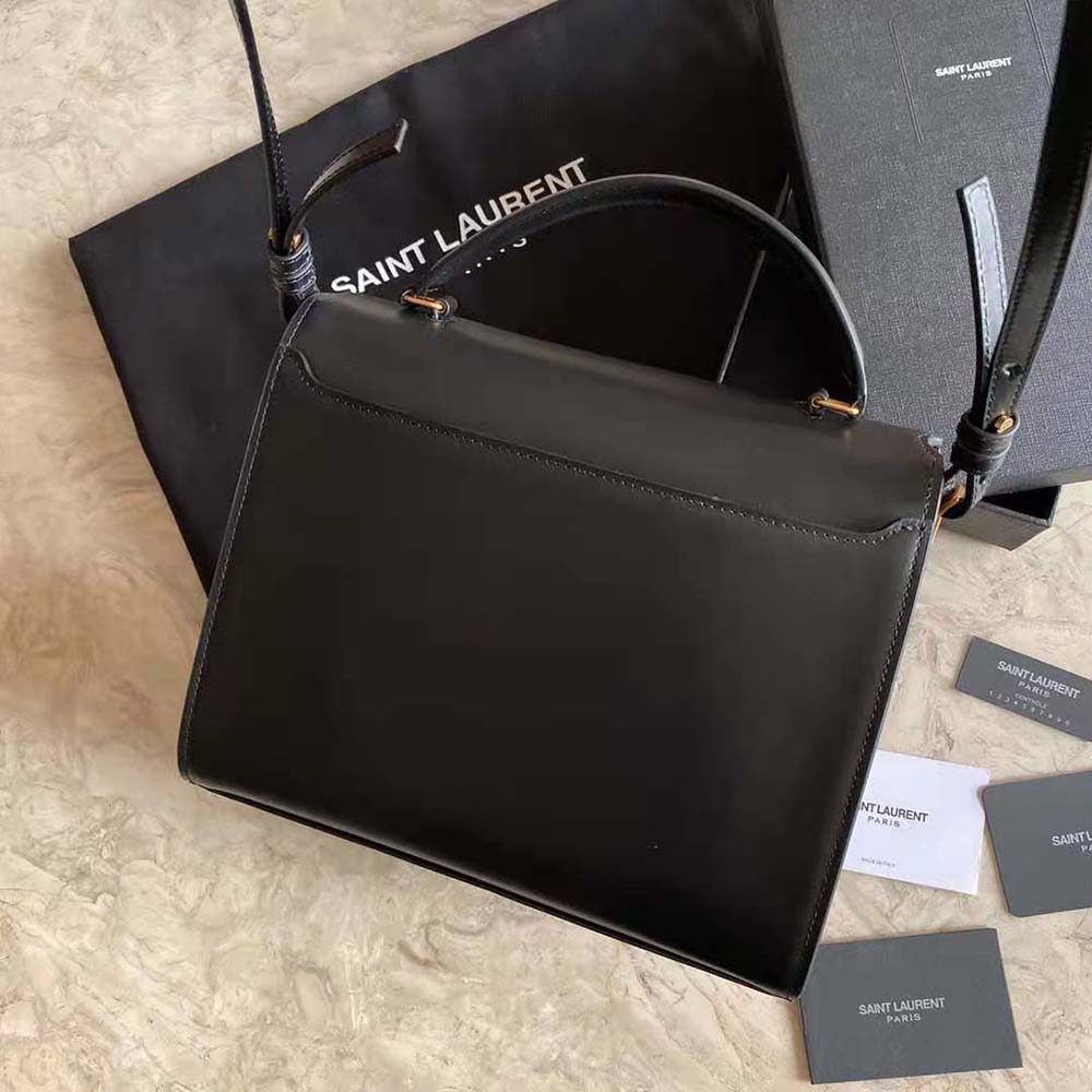 Side angle showing embossed texture and chain strap of Saint Laurent Cassandra bag