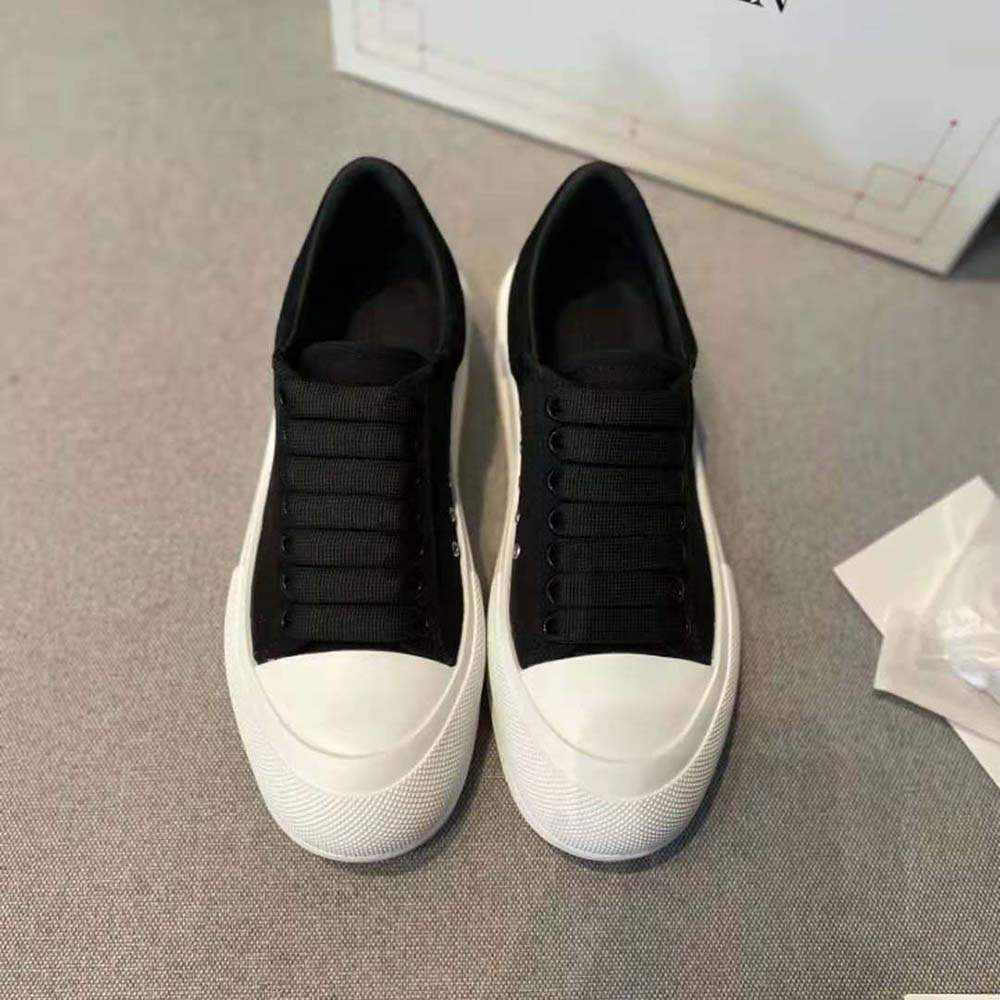 Close-up of black leather and laces on Alexander Mcqueen Women Deck Lace Up Plimsoll-Black
