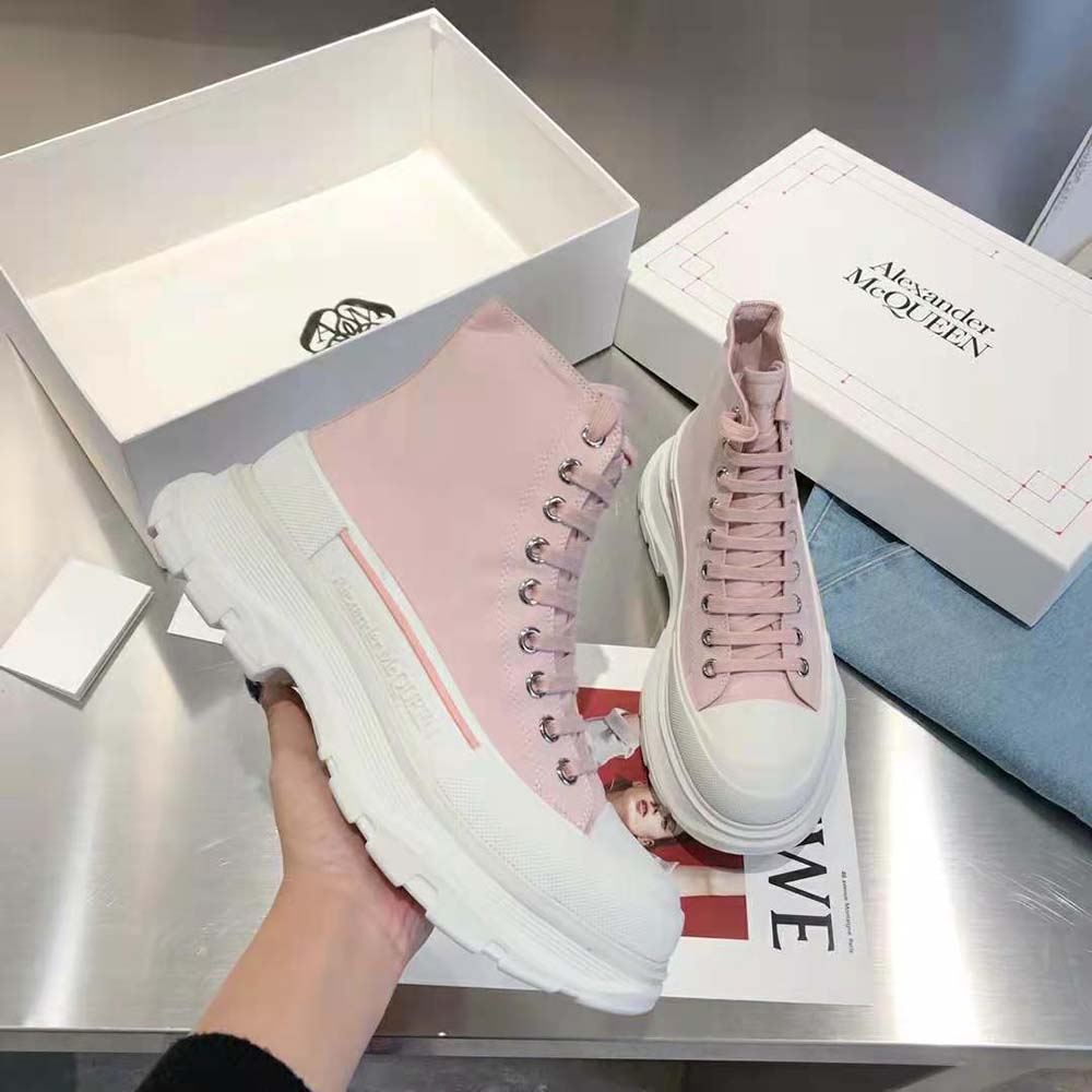 Top view showing lace-up closure and smooth leather of Alexander Mcqueen pink boot