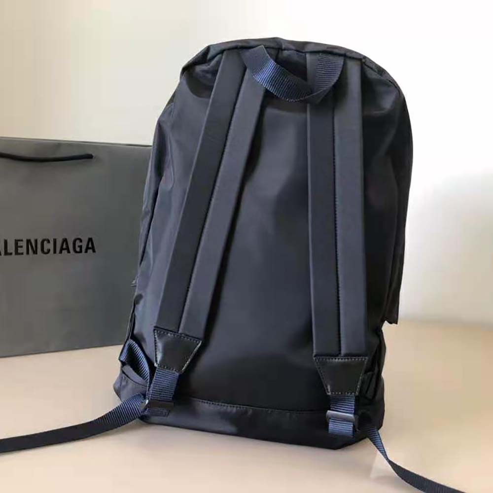 Side profile showing silver hardware on Balenciaga Men Wheel Backpack