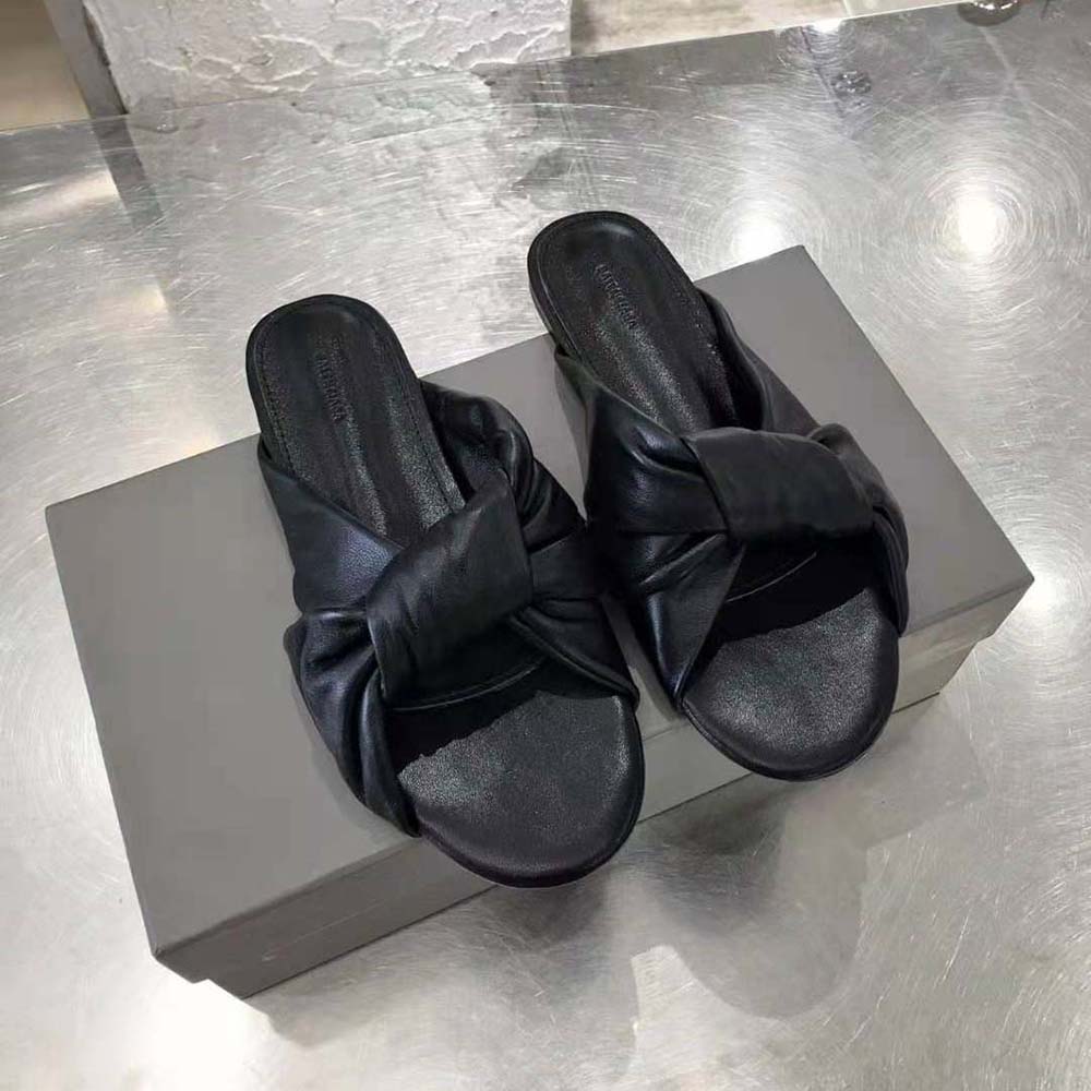 Close-up of draped black smooth nappa lambskin on Balenciaga sandal