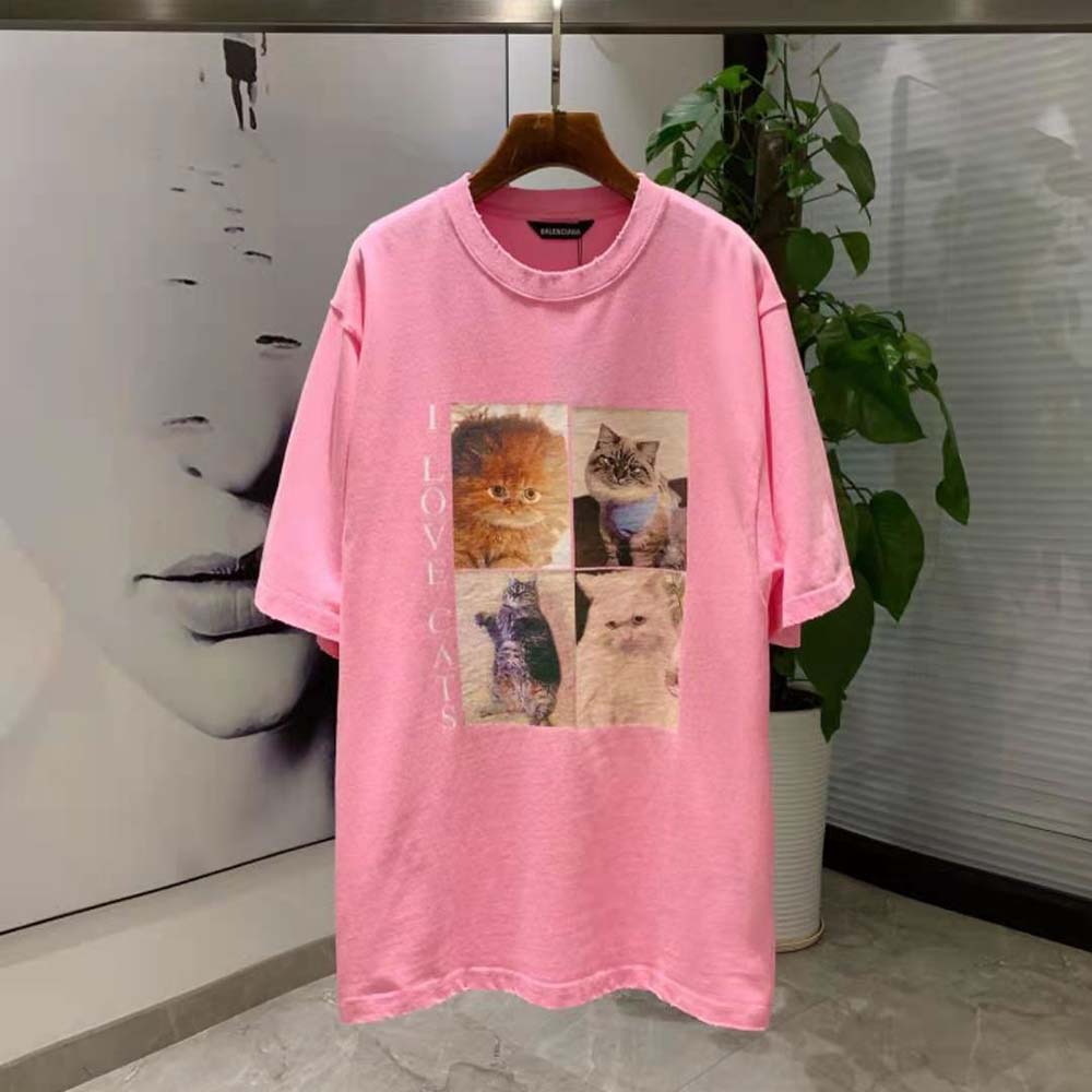 Close-up on graphic and soft cotton fabric of Balenciaga pink T-shirt