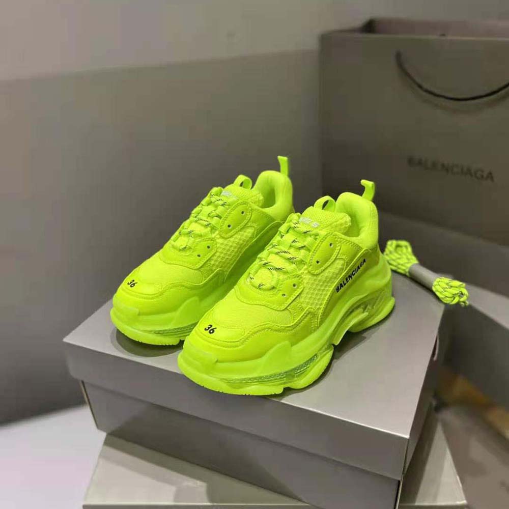 Close-up of neon yellow mesh and double foam on Balenciaga Triple S sneaker