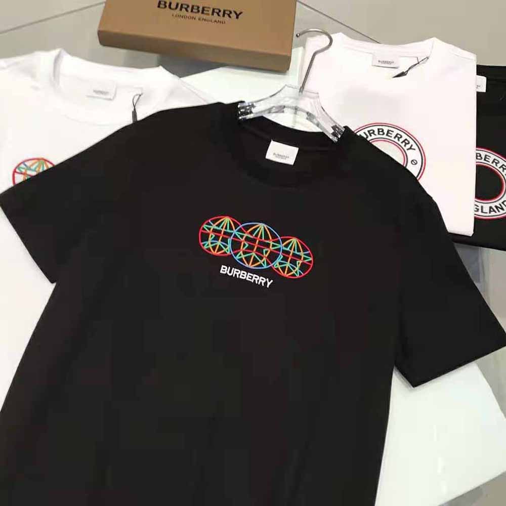 Side profile showing fit and sleeve length of Burberry Men Embroidered Globe Graphic T-shirt
