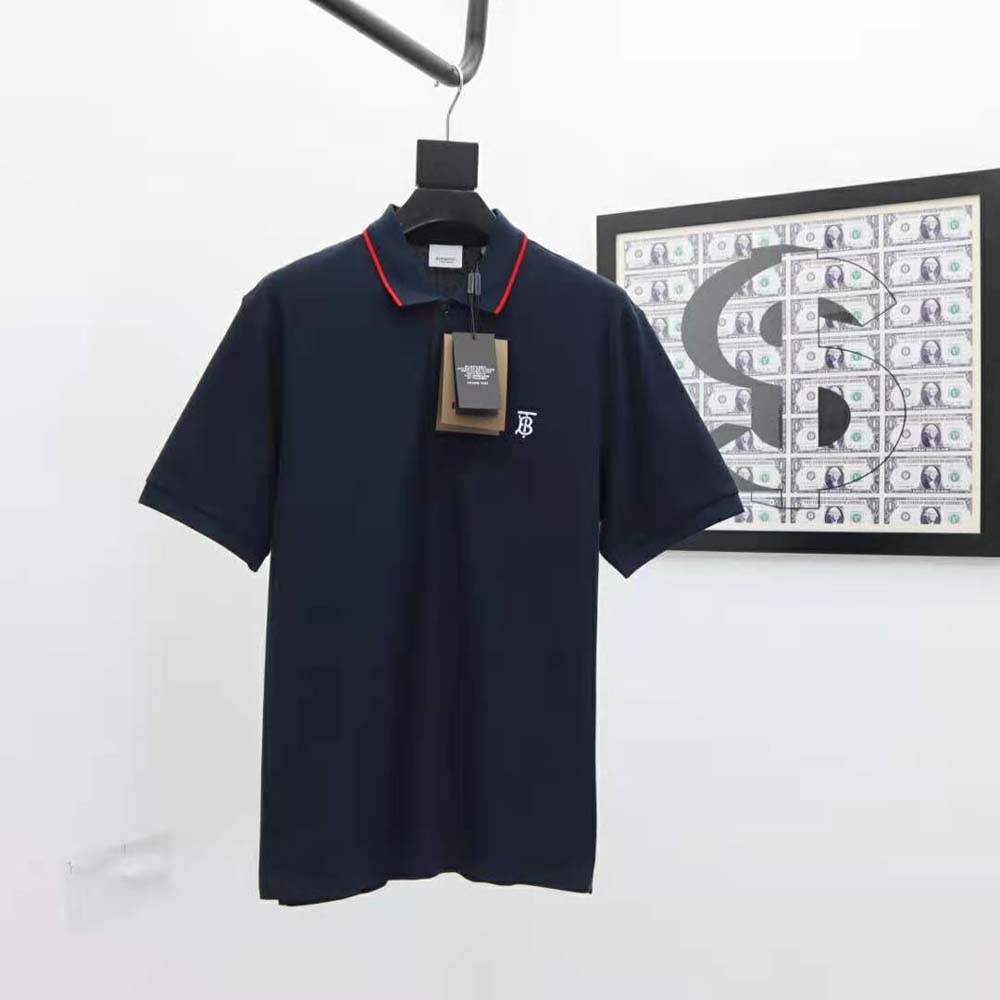 Close-up of striped placket on Burberry Men Icon Stripe Placket Cotton Piqué Polo Shirt-Navy