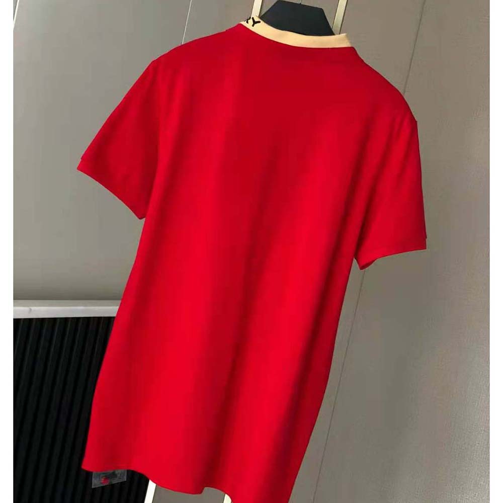 Side angle showing button closure on Burberry Men Logo Detail Polo Shirt