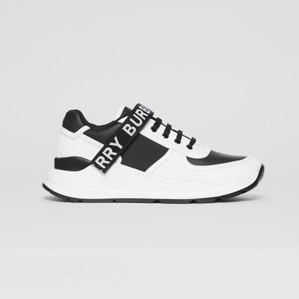 Side profile of Burberry Unisex Logo Detail Leather and Nylon Sneakers-Black