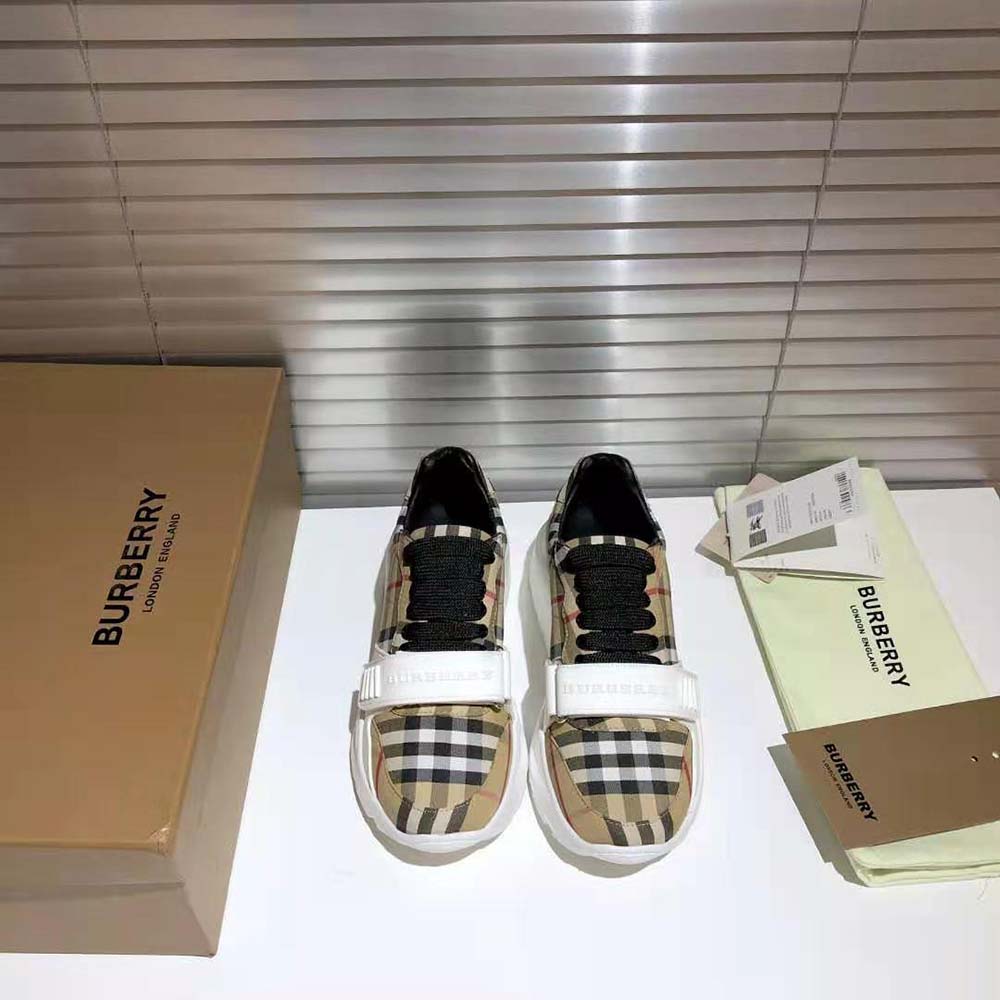 Side profile showing vintage check detail on Burberry cotton sneakers