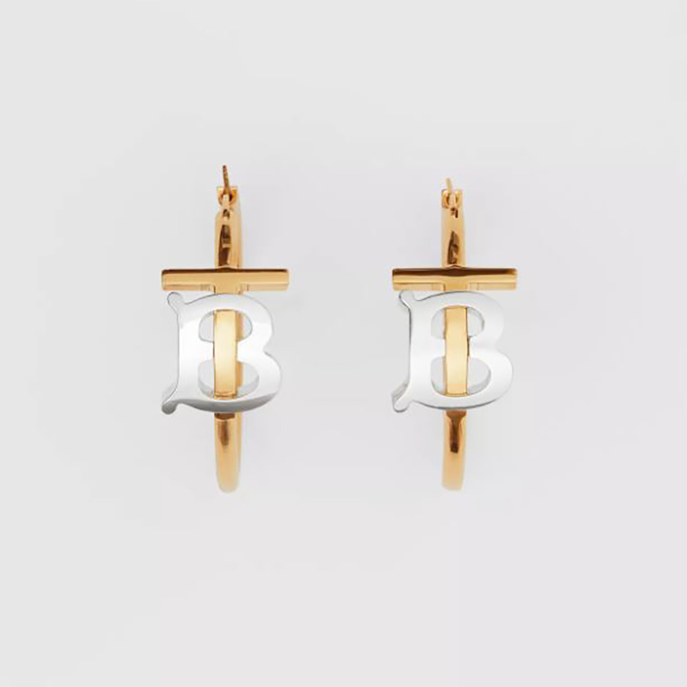 Close-up of Burberry Women Gold and Palladium-plated Monogram Motif Earrings front view