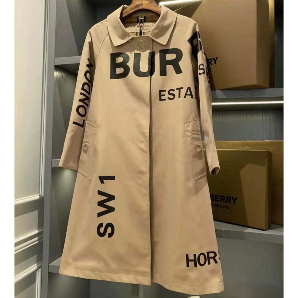 Side profile showing tailored silhouette of Burberry Women Horseferry Print Car Coat