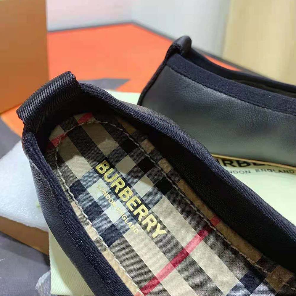 Overhead view showing vintage check cotton and leather trim details
