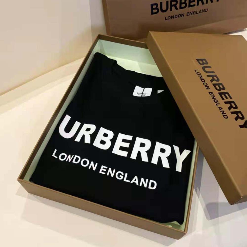 Close-up of Burberry logo print detail on black cotton t-shirt