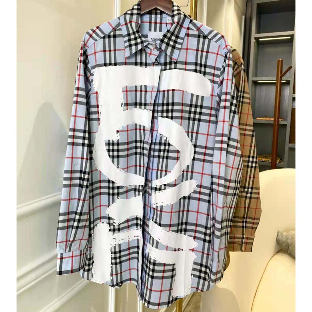 Close-up of silver vintage check pattern on Burberry oversized shirt