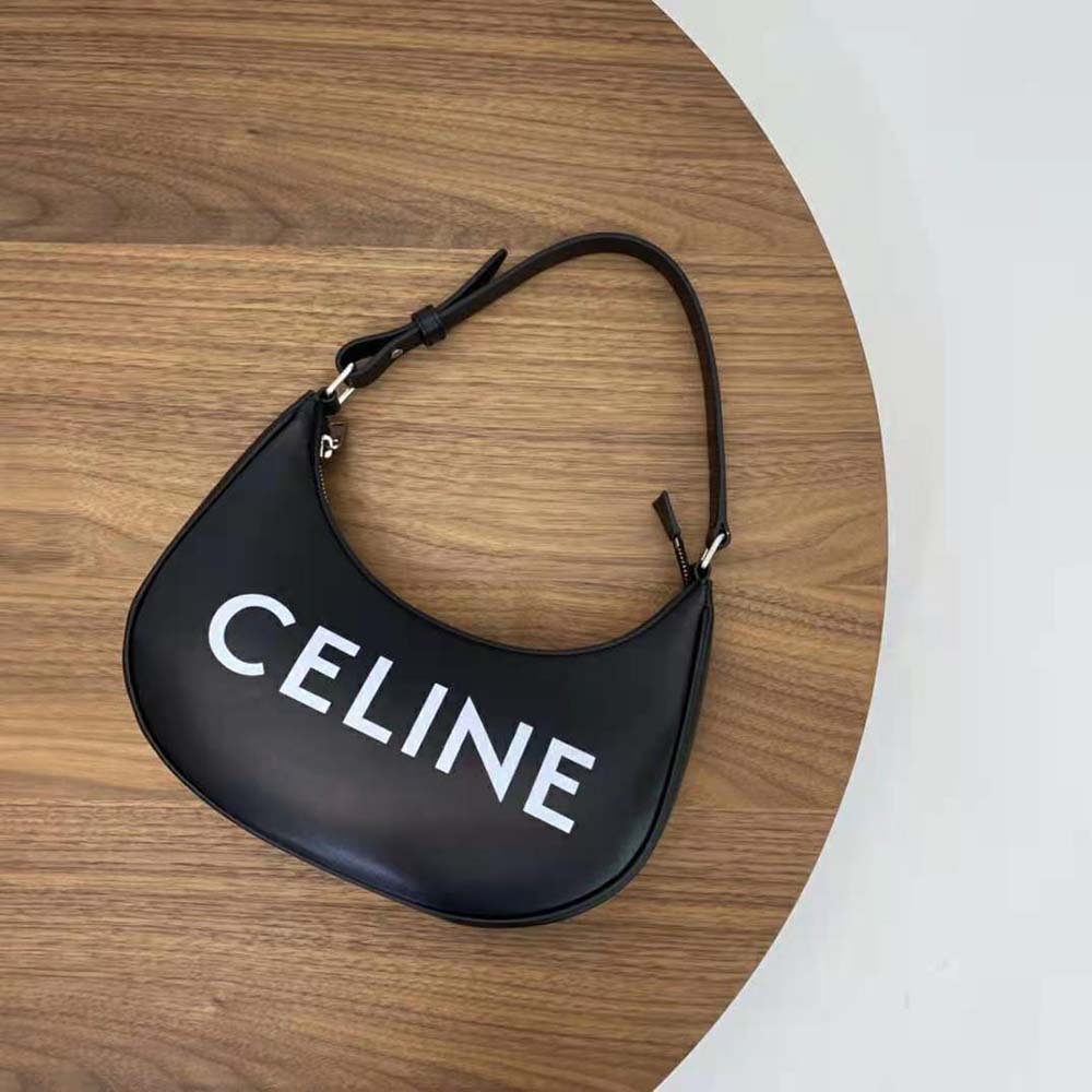 Close-up detail of gold hardware and Celine print on Ava Bag
