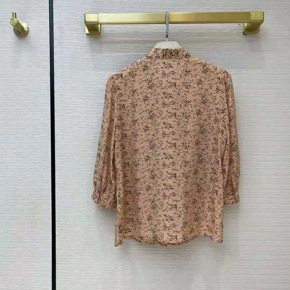 Side angle showcasing silhouette of Celine Women Blouse with Bow