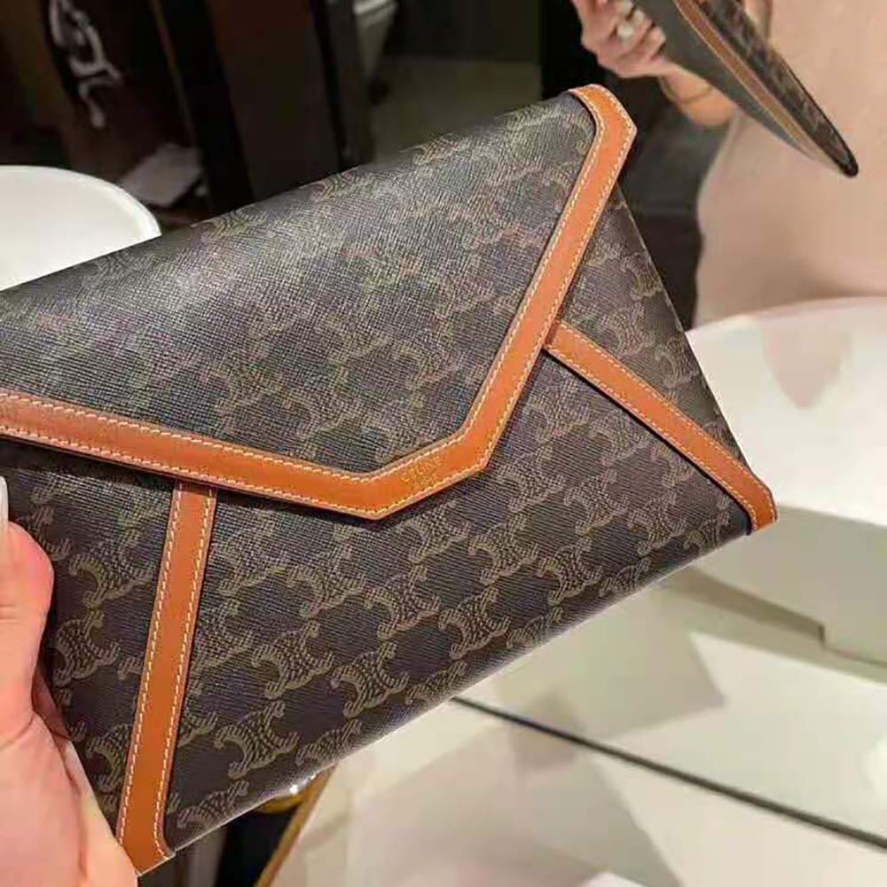 Close-up of gold hardware clasp on Celine Women Envelop Small Pouch