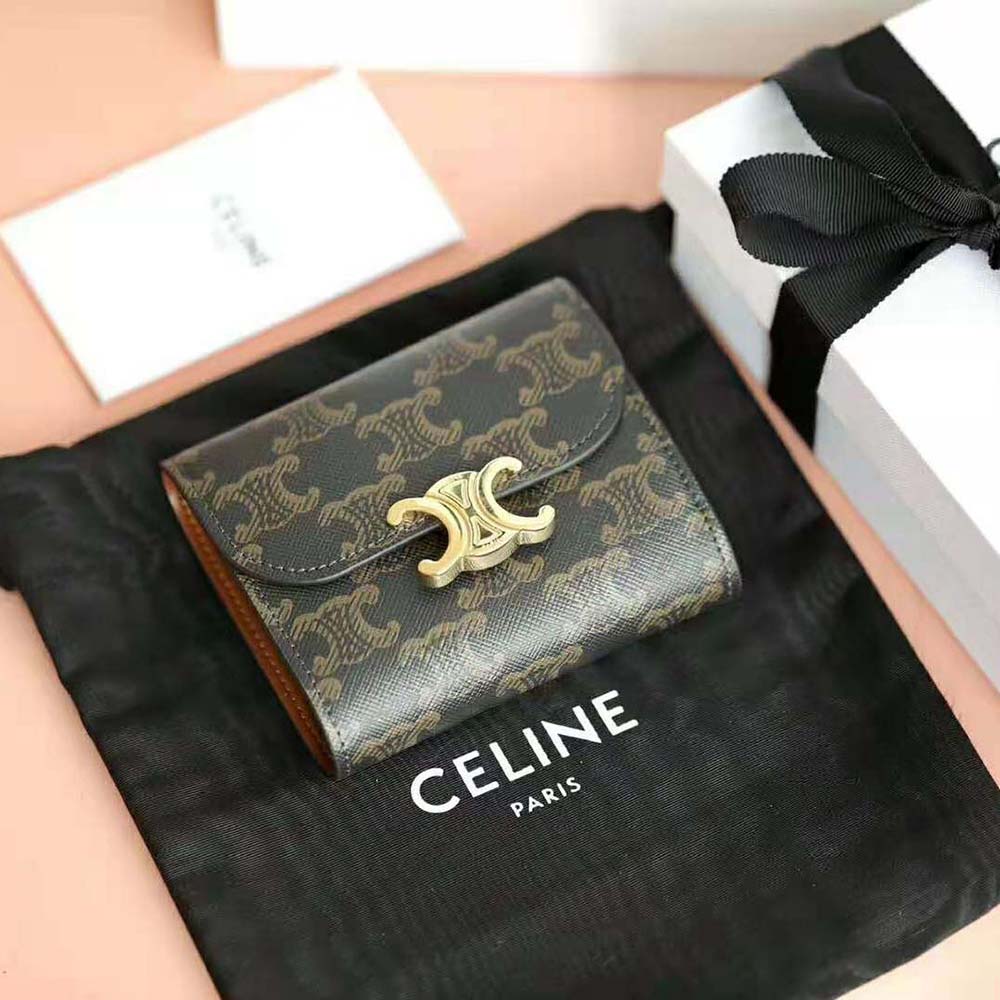 Close-up of gold Triomphe clasp on Celine Small Triomphe Wallet