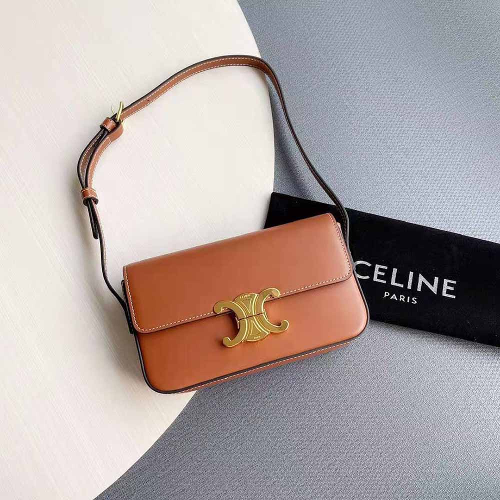 Close-up of gold Triomphe clasp on Celine Women Triomphe Shoulder Bag