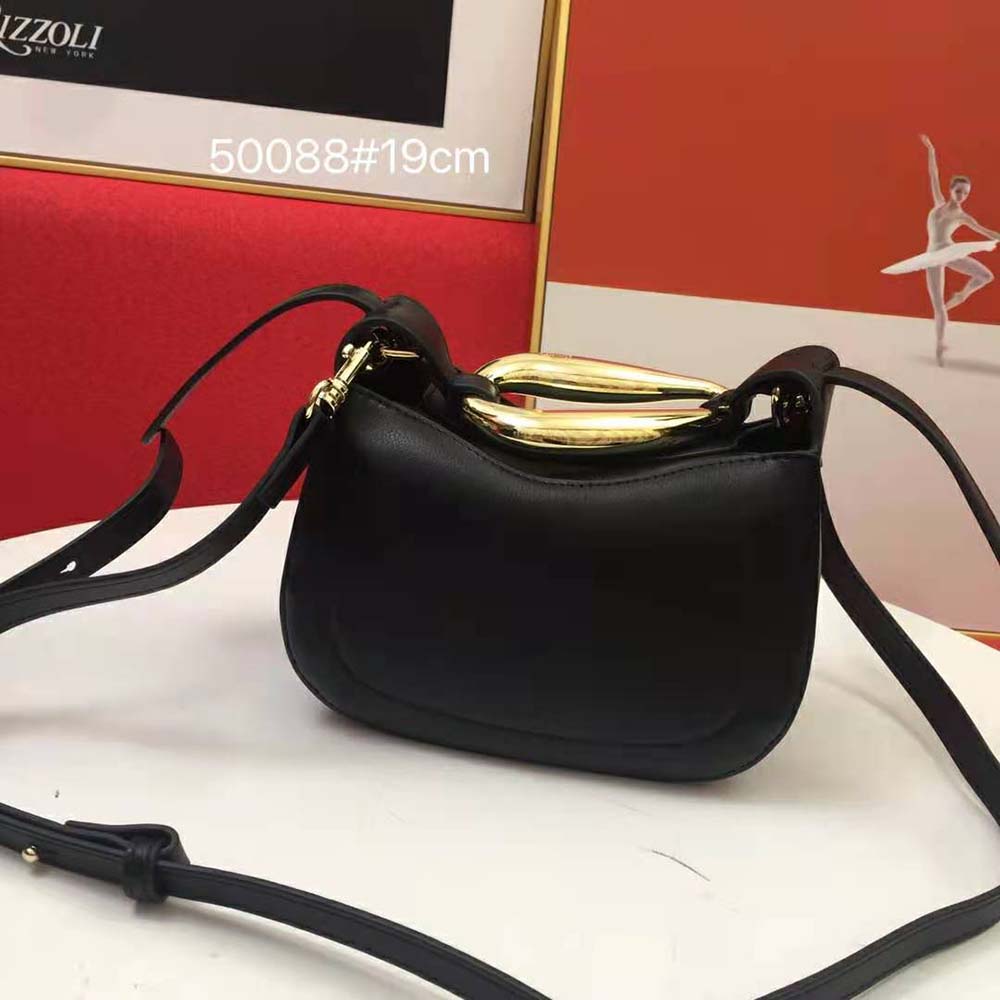 Side profile showing compact silhouette of Chloe Women Kiss Small Purse