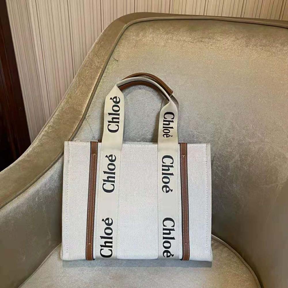 Close-up of woody ribbon and gold hardware detail on Chloe Medium Woody Tote