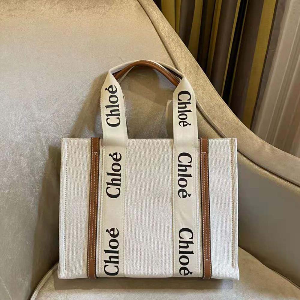 Side angle showing structured silhouette of Chloe Women Medium Woody Tote Bag