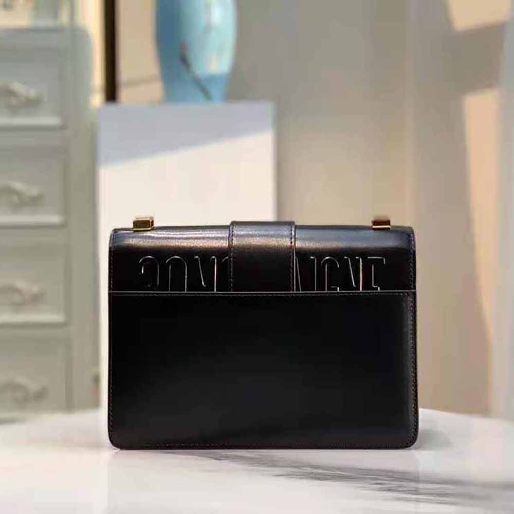 Side angle showing silhouette of Dior Women 30 Montaigne Bag Des Vents