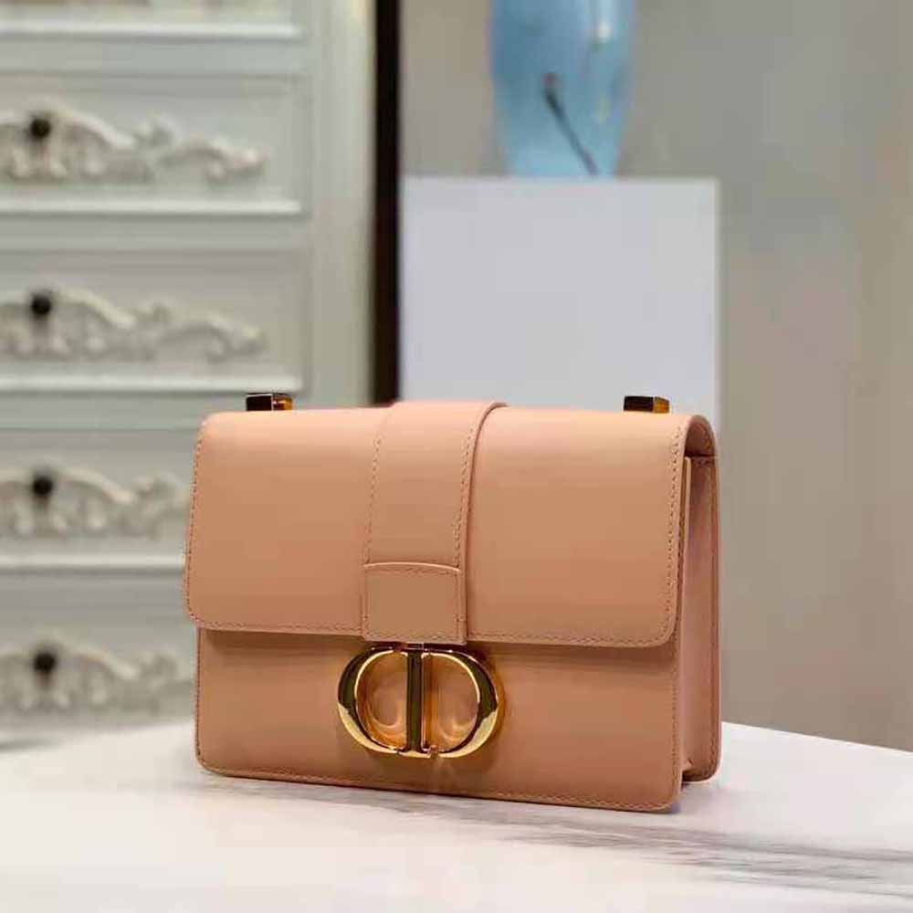 Side profile showing pink leather texture on Dior Women 30 Montaigne Bag Des Vents Box Calfskin-Pink