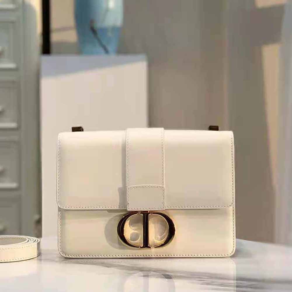 Close-up detail of white box calfskin and hardware on Dior 30 Montaigne Bag