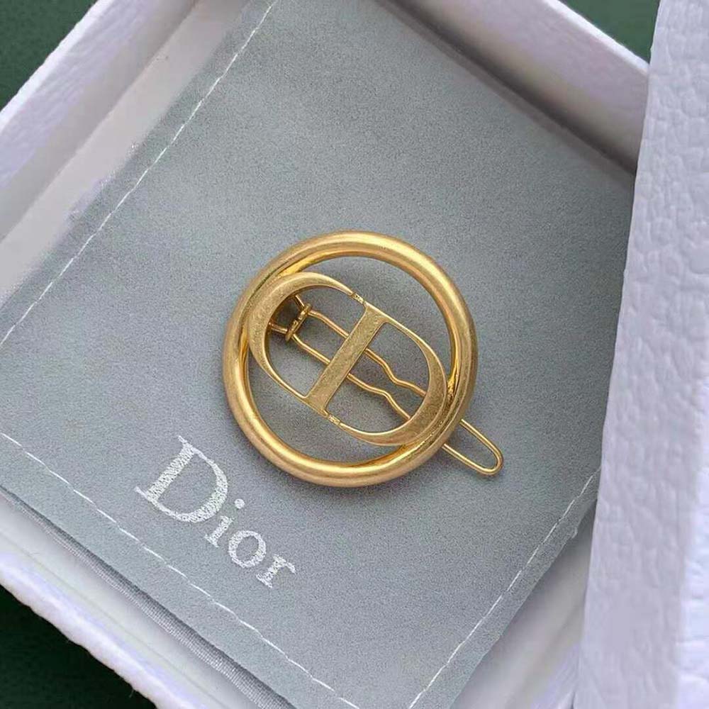 Styling shot with Dior Women 30 Montaigne Barrette Gold-Finish Metal in elegant hair