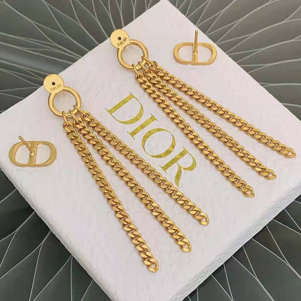 Side angle showcasing clasp and silhouette of Dior Women 30 Montaigne Earrings