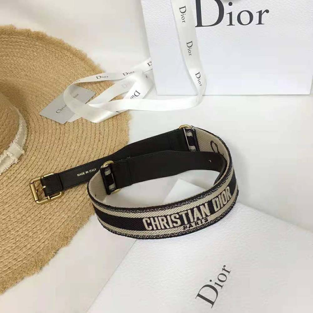 Side angle showing slim silhouette of Dior Women Christian Dior Belt in blue and cream