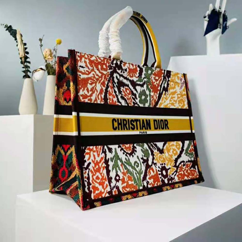Side angle showing silver hardware on Dior Women Dior Book Tote Yellow