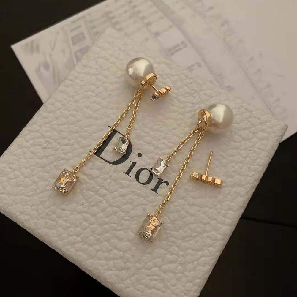 Close-up detail of white resin pearls on Dior Women Dior Tribales Earrings