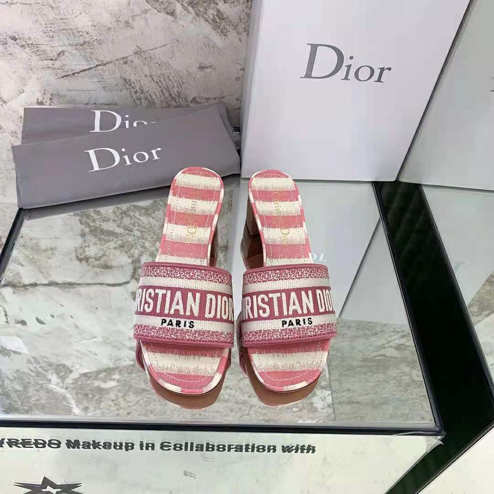 Close-up of signature D-stripes embroidery on Dior Women Dway Heeled Slide