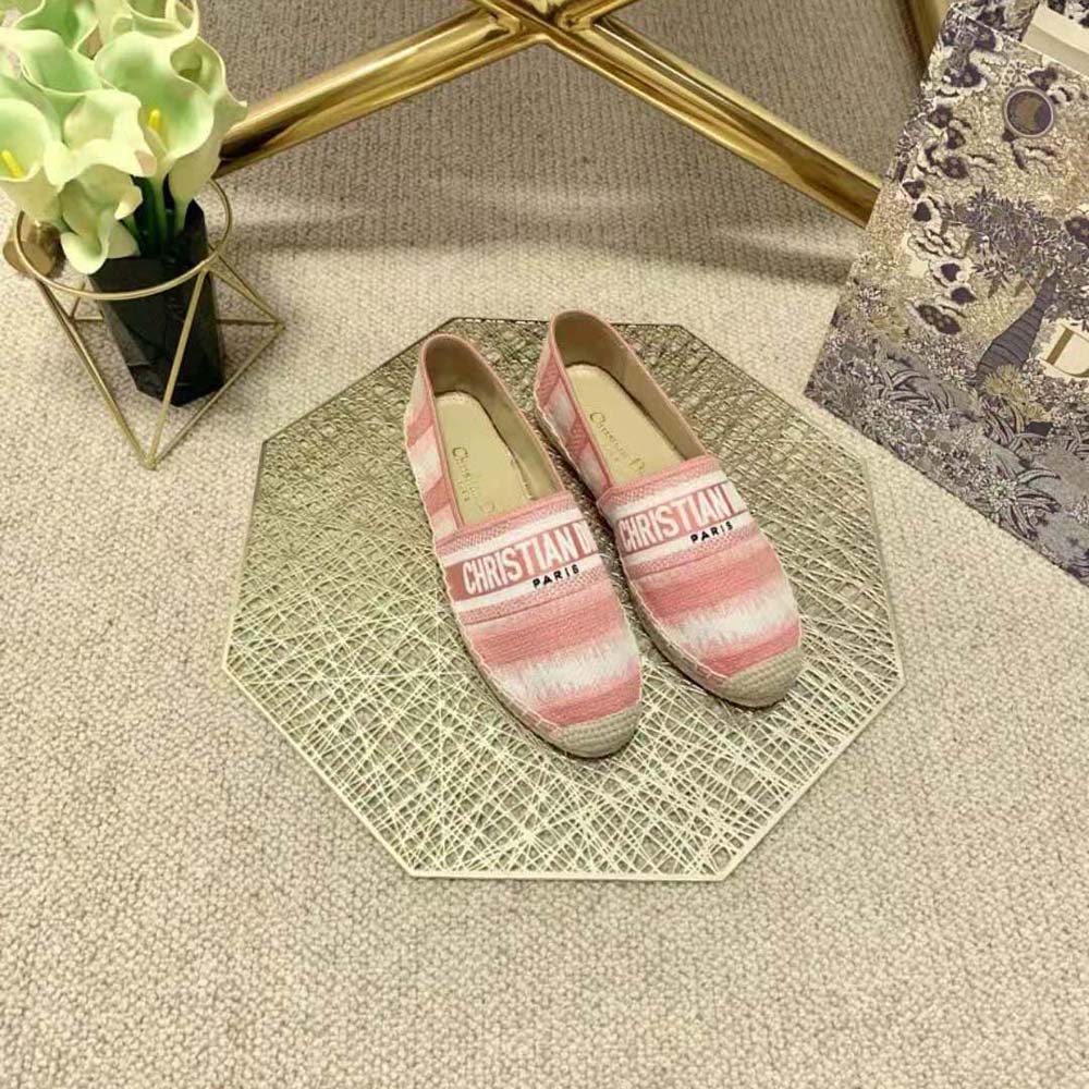 Top angle showing loafer silhouette and leather trim on Dior Granville shoes