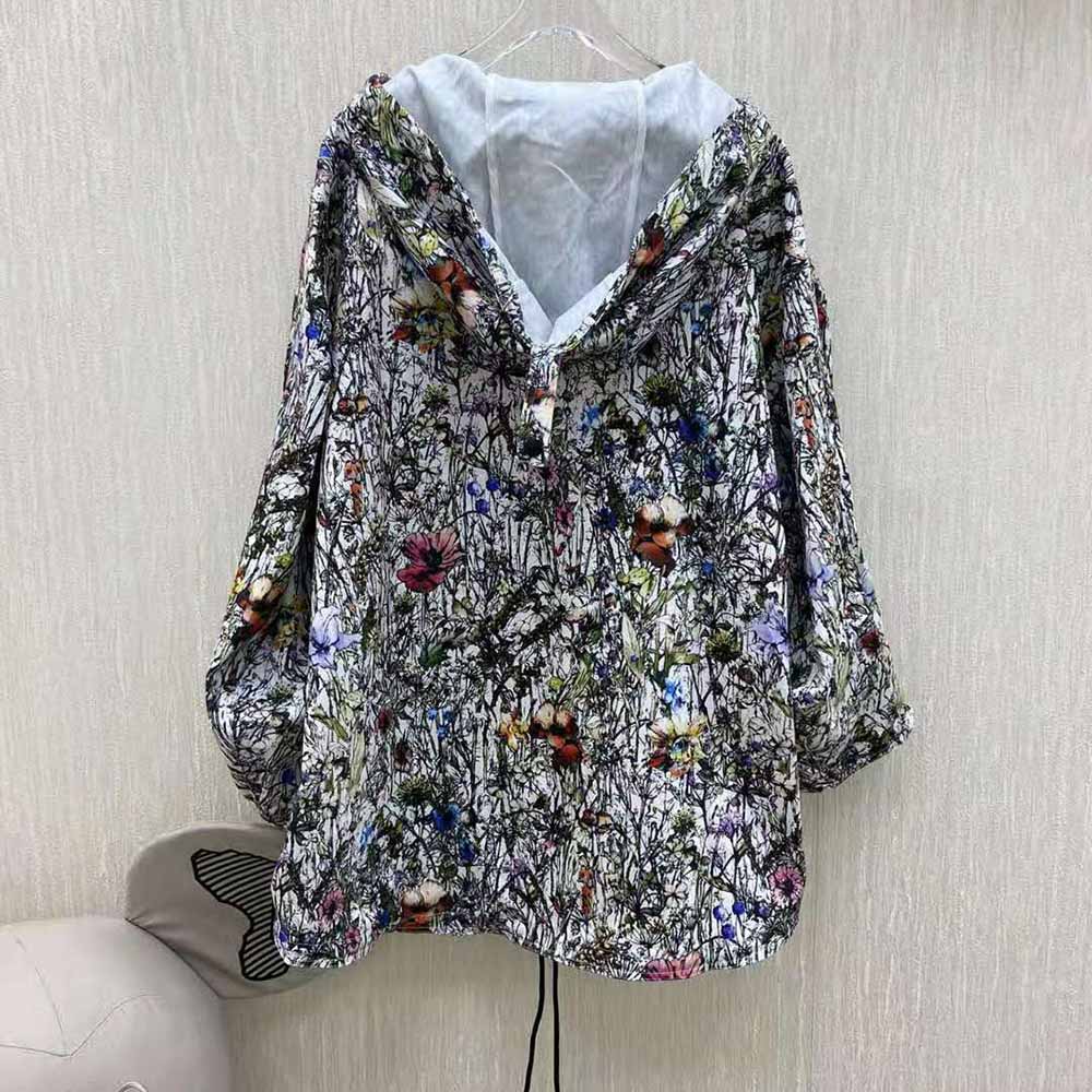 Side angle showing relaxed silhouette of Dior Women Hooded Anorak
