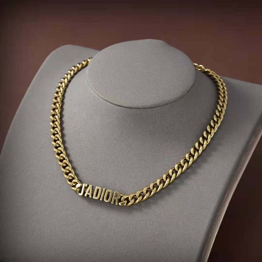 Side view of Dior Women J Adior Bracelet Antique Gold-Finish Metal on wrist